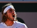Greece's Stefanos Tsitsipas reacts as he plays against Germany's Alexander Zverev during their men's singles semi-final tennis match on Day 13 of The Roland Garros 2021 French Open tennis tournament in Paris on June 11, 2021.