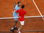 File Photo of Rafael Nadal and Novak Djokovic (in red) during the 2020 French Open final.