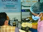 A medic administers Covaxin, developed by Bharat Biotech (PTI). A medic administers Covaxin, developed by Bharat Biotech (PTI).