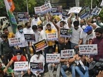 Activists of India's opposition Congress party hold placards and shout slogans against the rise in fuel prices in New Delhi.(AP) Activists of India's opposition Congress party hold placards and shout slogans against the rise in fuel prices in New Delhi.(AP)