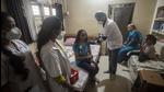 A beneficiary gets her Covid-19 vaccine jab at home during a door-to-door vaccination drive at Shaniwar peth in Pune on Thursday, June 10. (Pratham Gokhale/HT photo) A beneficiary gets her Covid-19 vaccine jab at home during a door-to-door vaccination drive at Shaniwar peth in Pune on Thursday, June 10. (Pratham Gokhale/HT photo)