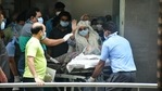 Saira Banu waves to the paparazzi as she takes Dilip Kumar home. Saira Banu waves to the paparazzi as she takes Dilip Kumar home.