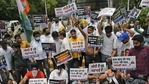 Activists of India's opposition Congress party hold placards and shout slogans against the rise in fuel prices in New Delhi.(AP) Activists of India's opposition Congress party hold placards and shout slogans against the rise in fuel prices in New Delhi.(AP)