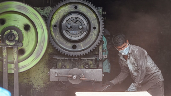 A worker busy at a factory in the Wazirpur Industrial area as lockdown curbs for industries and construction activity are eased in New Delhi. (Shahbaz Khan / PTI) A worker busy at a factory in the Wazirpur Industrial area as lockdown curbs for industries and construction activity are eased in New Delhi. (Shahbaz Khan / PTI)