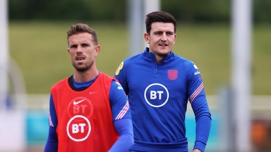 England's Harry Maguire and Jordan Henderson during training. (REUTERS)