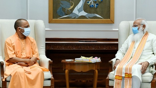 Uttar Pradesh Chief Minister Yogi Adityanath meets Prime Minister Narendra Modi at his official residence, in New Delhi on Friday. (ANI Photo)