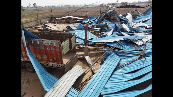 The roof of a rice-sheller firm that was blown away in the storm at Daunkalan village in Patiala district on Thursday night. (HT Photo) The roof of a rice-sheller firm that was blown away in the storm at Daunkalan village in Patiala district on Thursday night. (HT Photo)