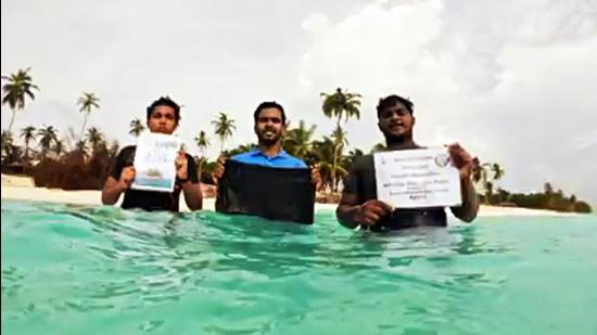 People hold placards during a 12-hour hunger strike against the regulations brought in by the Lakshadweep administration, in Lakshadweep on Monday, June 7. (File photo) People hold placards during a 12-hour hunger strike against the regulations brought in by the Lakshadweep administration, in Lakshadweep on Monday, June 7. (File photo)