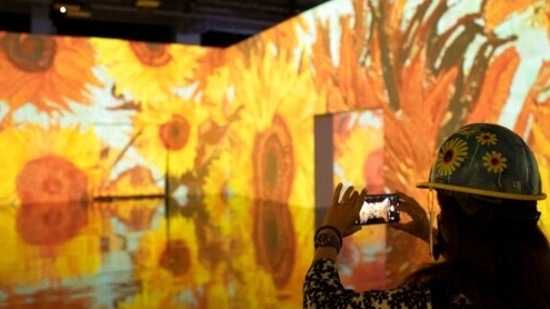 Members of the media tour the Immersive Van Gogh show, Wednesday, May 26, 2021 at Pier 36 in New York. The exhibit celebrates the work of the 19th century Dutch impressionist painter.(AP)