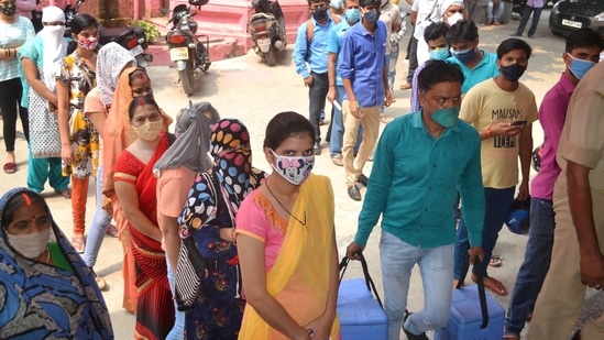 Varanasi: People wait to receive a dose of the Covid-19 vaccine at a vaccination centre in Varanasi, on Friday, June 11, 2021. (PTI) Varanasi: People wait to receive a dose of the Covid-19 vaccine at a vaccination centre in Varanasi, on Friday, June 11, 2021.