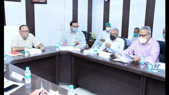 Vice chancellor of Dr BR Ambedkar University prof Ashok Mittal (extreme left) presiding over the meeting of examination committee of the university. (HT photo) Vice chancellor of Dr BR Ambedkar University prof Ashok Mittal (extreme left) presiding over the meeting of examination committee of the university. (HT photo)