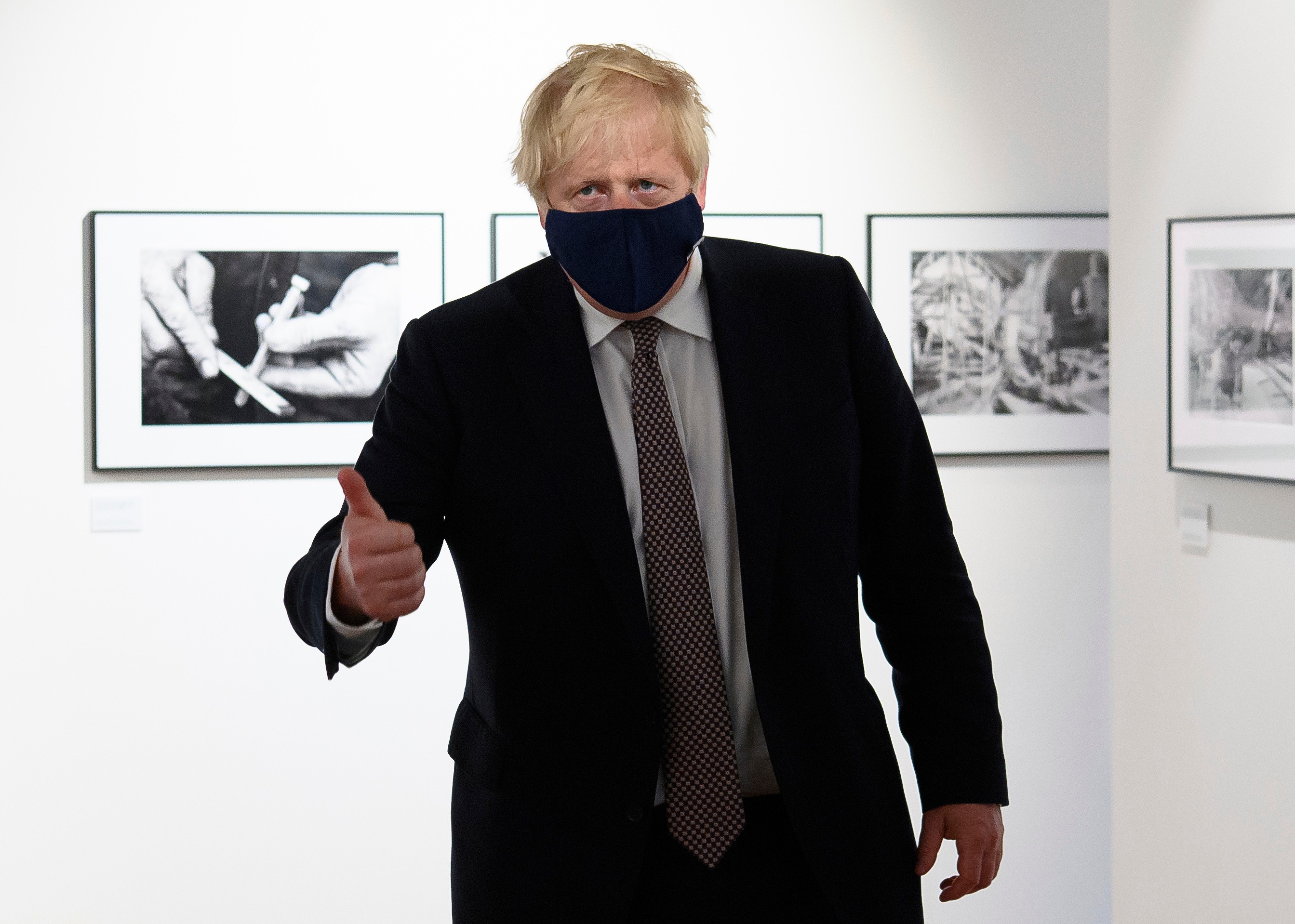Britain's Prime Minister Boris Johnson reacts during a visit to meet with volunteers during a visit to Falmouth's Maritime Museum, England, on Thursday, June 10, 2021. (AP) Britain's Prime Minister Boris Johnson reacts during a visit to meet with volunteers during a visit to Falmouth's Maritime Museum, England, on Thursday, June 10, 2021. (AP)