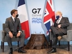 UK Prime Minister Boris Johnson and French President Emmanuel Macron attend a bilateral meeting during G7 summit in Cornwall.