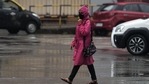 A woman wearing a raincoat and face mask walks in the rain at Dadar in Mumbai, India, on Friday, June 11, 2021. (Photo by Satish Bate/Hindustan Times) A woman wearing a raincoat and face mask walks in the rain at Dadar in Mumbai, India, on Friday, June 11, 2021. (Photo by Satish Bate/Hindustan Times)