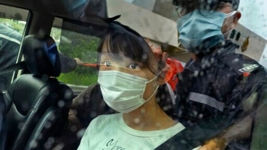 Agnes Chow, a prominent pro-democracy activist who was sentenced to jail last year for her role in an unauthorized protest, is released in Hong Kong Saturday, June 12, 2021. Chow rose to prominence as a student leader in the now-defunct Scholarism and Demosisto political groups, alongside other outspoken activists such as Joshua Wong and Ivan Lam. (AP Photo/Vincent Yu) Agnes Chow, a prominent pro-democracy activist who was sentenced to jail last year for her role in an unauthorized protest, is released in Hong Kong Saturday, June 12, 2021. Chow rose to prominence as a student leader in the now-defunct Scholarism and Demosisto political groups, alongside other outspoken activists such as Joshua Wong and Ivan Lam. (AP Photo/Vincent Yu)