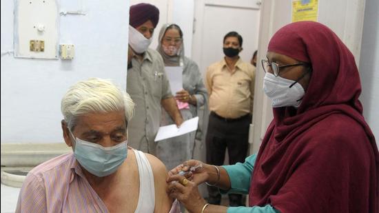 File photo: A resident gets the Covid-19 vaccine shot. (Ravi Kumar/ Hindustan Times) File photo: A resident gets the Covid-19 vaccine shot. (Ravi Kumar/ Hindustan Times)