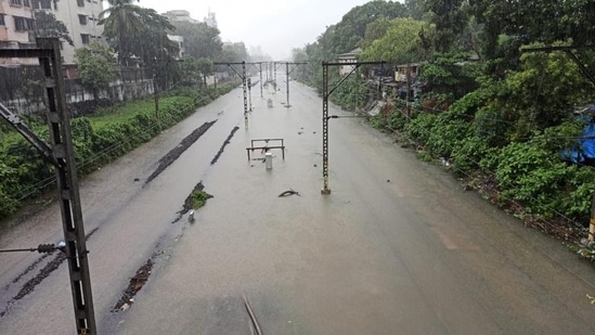 Waterlogging on railway track in Sion following heavy rain in Mumbai. (Satish Bate/HT photo) Waterlogging on railway track in Sion following heavy rain in Mumbai. (Satish Bate/HT photo)