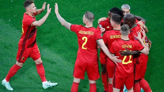 Belgium's Romelu Lukaku, right, celebrates after scoring his sides first goal during the Euro 2020 match.(AP)