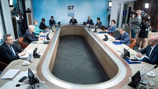 A general view of G7 leaders and their guests at a working session during the G7 summit in Carbis Bay, Cornwall, UK.(AFP)