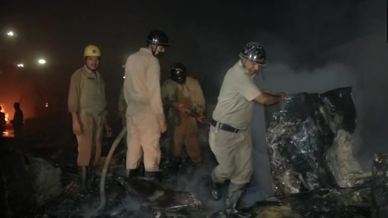 Firefighting operation underway in Madanpur Khadar area near Kalindi Kunj. (ANI)