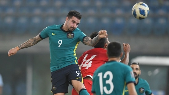 Australia's Jamie Maclaren heads the ball during the World Cup 2022 Group B qualifying soccer match between Nepal and Australia in Kuwait City, Kuwait, Friday. June 11, 2021. (AP) Australia's Jamie Maclaren heads the ball during the World Cup 2022 Group B qualifying soccer match between Nepal and Australia in Kuwait City, Kuwait, Friday. June 11, 2021. (AP)