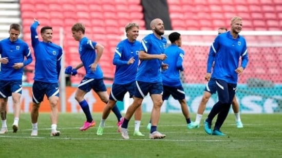 Finland's Teemu Pukki, center, exercises with his team during a team training session at Parken stadium in Copenhagen.(AP)