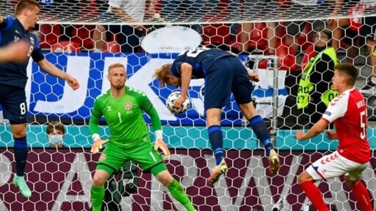 The first goal arrived at the hour mark when Joel Pohjanpalo's header scrambled past Denmark goalkeeper Kasper Schmeichel. (REUTERS) The first goal arrived at the hour mark when Joel Pohjanpalo's header scrambled past Denmark goalkeeper Kasper Schmeichel. (REUTERS)