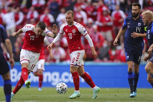 Denmark had a frustrating opening 30 minutes. Despite creating several chances  and having several attempts at goal, they were unable to score, just like Jonas Wind here. His attempt was saved by the Finland goalkeeper
