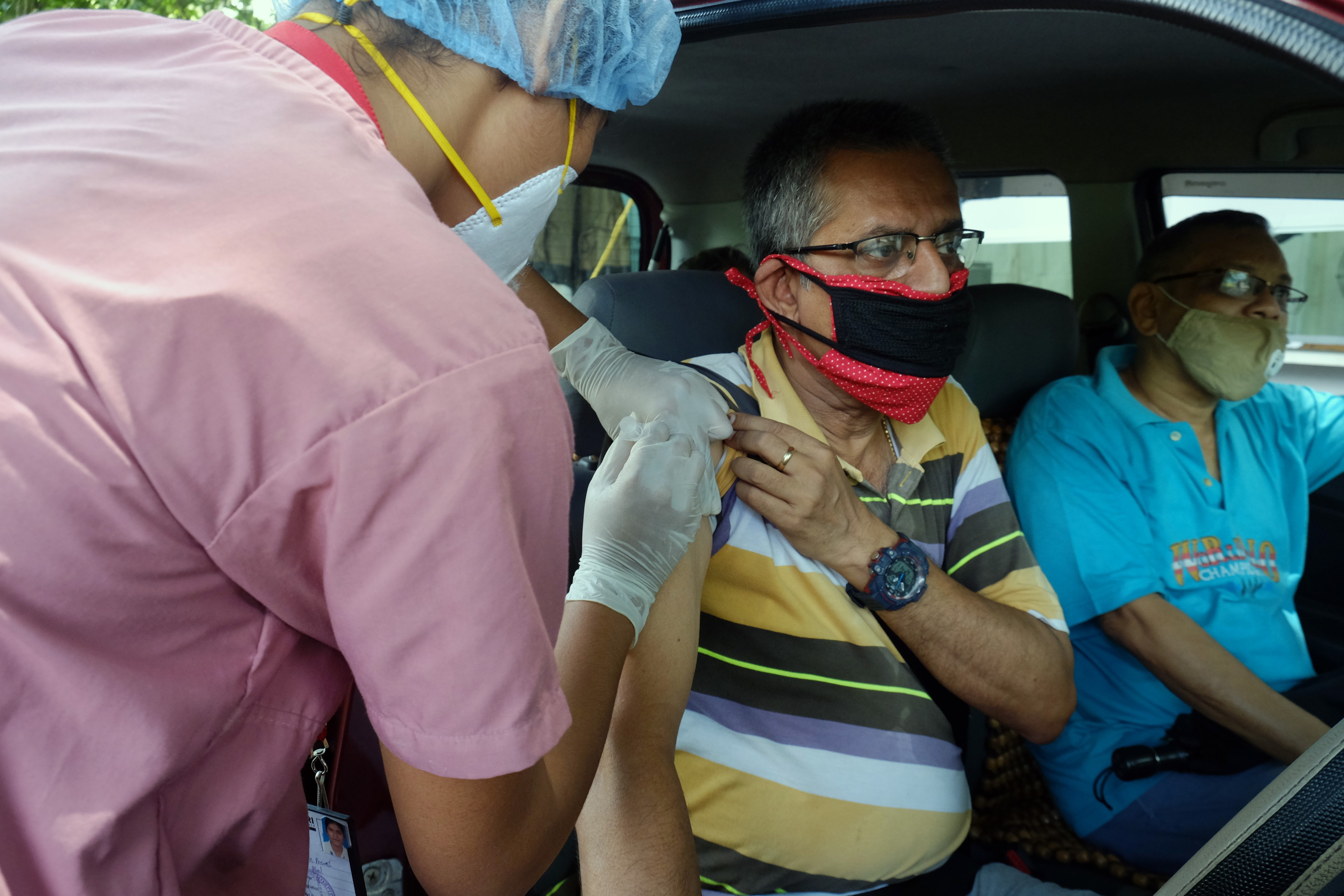 A healthcare worker inoculates the dose of the Covid-19 vaccine to a beneficiary during the vaccination drive, at Tala Park in Kolkata on Friday. (ANI Photo) A healthcare worker inoculates the dose of the Covid-19 vaccine to a beneficiary during the vaccination drive, at Tala Park in Kolkata on Friday. (ANI Photo)