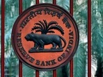A Reserve Bank of India (RBI) logo is seen at the gate of its office in New Delhi.