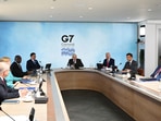 G7 leaders and guests during the 2021 summit in Cornwall, England. G7 leaders and guests during the 2021 summit in Cornwall, England.