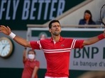 Novak Djokovic reacts after winning a point against Stefanos Tsitsipas of Greece during their final match of the French Open.(AP)