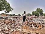 A man stands on the rubble of demolished houses in Jewar’s Nagla Ganeshi, one of the seven villages that have been acquired for construction of an international airport. (HT Photo) A man stands on the rubble of demolished houses in Jewar’s Nagla Ganeshi, one of the seven villages that have been acquired for construction of an international airport. (HT Photo)