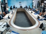 A general view of G7 leaders and their guests at a working session at the G7 summit in Carbis Bay, Cornwall, England. A general view of G7 leaders and their guests at a working session at the G7 summit in Carbis Bay, Cornwall, England.