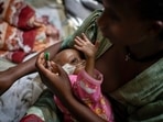 Birhan Etsana, 27, from Dengelat, uses a nasogastric tube to feed her malnourished baby, Birhan Etsana, 27, from Dengelat, uses a nasogastric tube to feed her malnourished baby,
