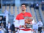 Novak Djokovic poses with the 2021 French Open title. (Twitter) Novak Djokovic poses with the 2021 French Open title. (Twitter)