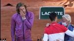 Former Swedish tennis ace Bjorn Borg, right, gives the cup to Serbia's Novak Djokovic while Stefanos Tsitsipas of Greece, left, react after their final match of the French Open. (AP) Former Swedish tennis ace Bjorn Borg, right, gives the cup to Serbia's Novak Djokovic while Stefanos Tsitsipas of Greece, left, react after their final match of the French Open. (AP)
