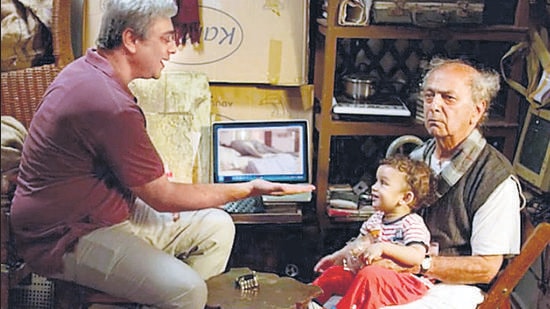 A still from the Marathi film” Baapjanma” with Sachin Khedekar (left) and two-year-old Raghav Joshi. (SCREEN GRAB) A still from the Marathi film” Baapjanma” with Sachin Khedekar (left) and two-year-old Raghav Joshi. (SCREEN GRAB)