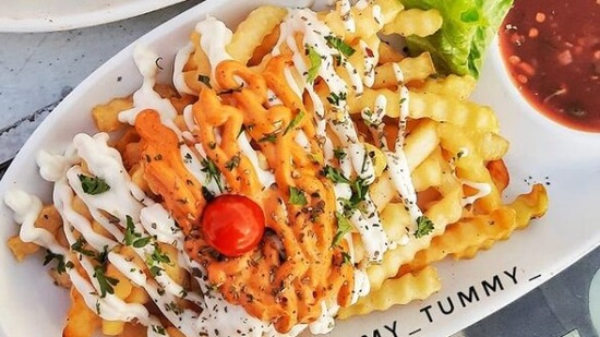 Cheesy fries: The most basic yet satisfying dish, cheesy fries can lift your mood instantly on a gloomy day.  (Instagram/yummy_tummy2003)