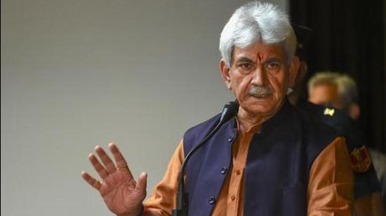 Jammu and Kashmir L-G Manoj Sinha visited slain BJP councillor Rakesh Pandita’s family to express solidarity. (PTI Photo/File)