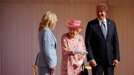 US President Joe Biden (R) and US First Lady Jill Biden (L) speak with Britain's Queen Elizabeth II (C) after watching the military march past at Windsor Castle in Windsor, west of London.(AFP) US President Joe Biden (R) and US First Lady Jill Biden (L) speak with Britain's Queen Elizabeth II (C) after watching the military march past at Windsor Castle in Windsor, west of London.(AFP)