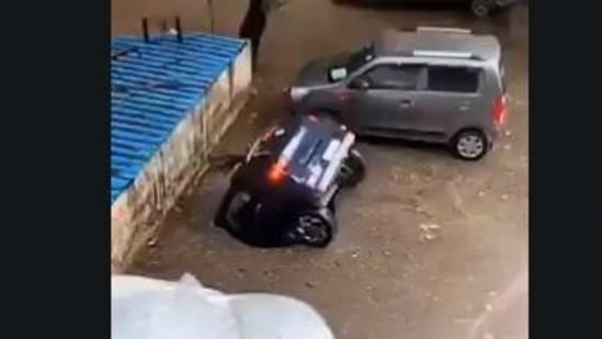 The car was seen disappearing under the water within 26 seconds in the video. (Screengrab/Twitter)