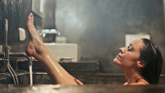 Shower after workout: Make sure to open your workout clothes immediately after you are done and directly hit the shower. Leaving sweat on your skin for long hours can trigger acne.(Unsplash)