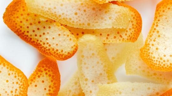 Orange peel powder & Rosewater: Dry the orange peels and grind them in a blender till it turns into a powder. Add some rose water and milk to it, mix well till it turns into a thick paste. Apply on affected areas, leave it for 10-15 minutes. Take some water on your fingers and gently scrub then rinse with cold water.(Unsplash)