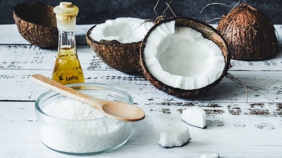 Coconut Oil: Rich in vitamin E, coconut oil has a lot of benefits on the skin and hair and is also used in several homemade remedies. It helps repair cell damage as well as lightens underarms and elbows.(Unsplash)