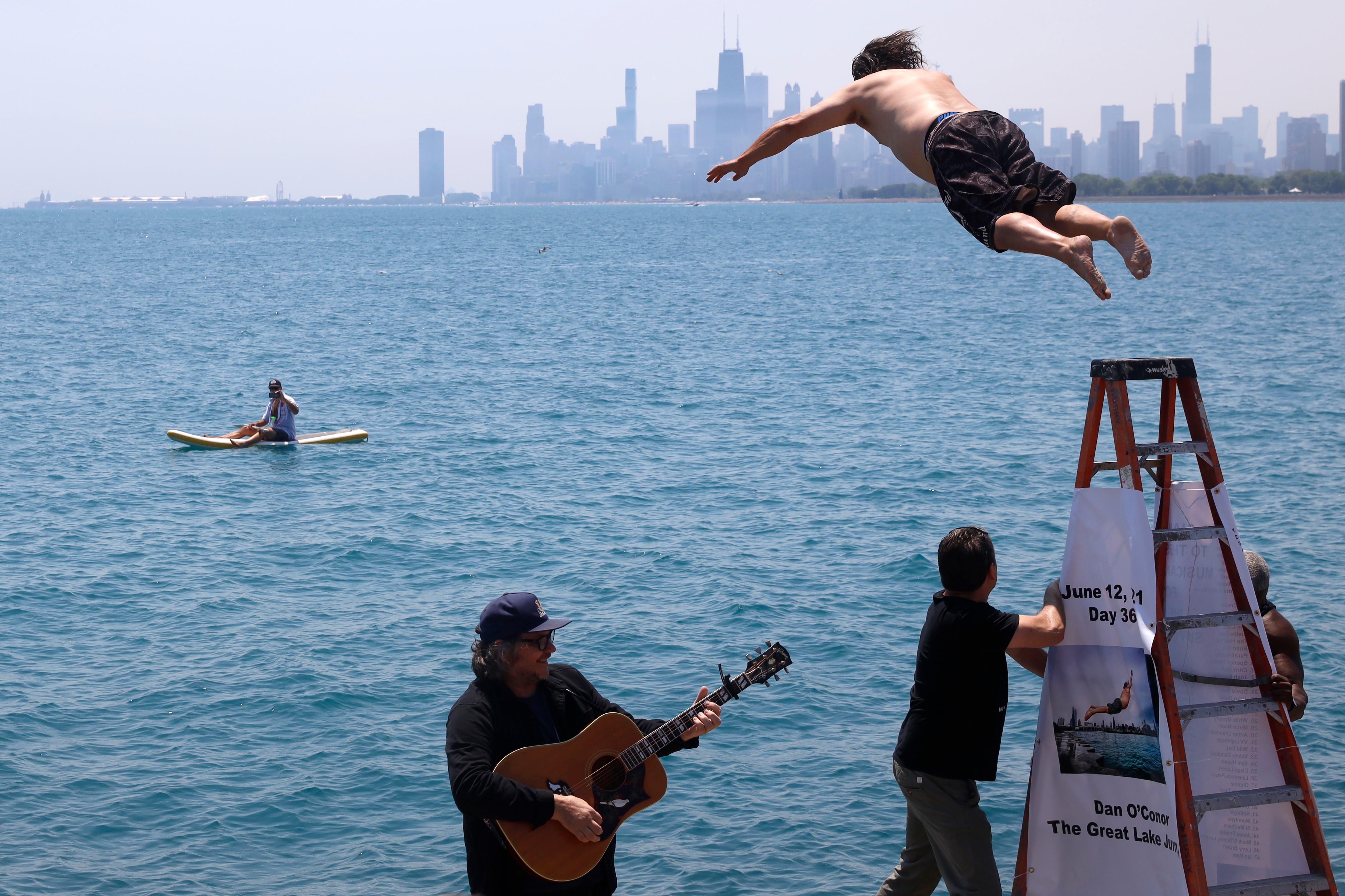 Dan O'Conor, the "Great Lake Jumper," makes his 365th leap into Lake Michigan.(AP) Dan O'Conor, the "Great Lake Jumper," makes his 365th leap into Lake Michigan.(AP)