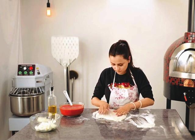 Pavitra (above) is self-taught and runs a small operation, but her pizzas are wonderful Pavitra (above) is self-taught and runs a small operation, but her pizzas are wonderful
