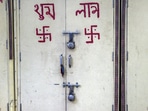 Locks hang on a store at Gujarati handicraft market in Janpath during the Covid-induced lockdown, in New Delhi, on June 13. With Covid-19 numbers in Delhi dropping to a three-month low, all market activities have been allowed from June 14, but with certain restrictions as part of the phased unlock plan of the Delhi government.
