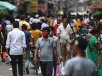 People shop at a market after the government eased restrictions as the number of new Covid-19 coronavirus infections dropped, in Gurgaon.(AFP) People shop at a market after the government eased restrictions as the number of new Covid-19 coronavirus infections dropped, in Gurgaon.(AFP)