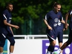 France's forwards Kylian Mbappe, Antoine Griezmann and Ousmane Dembele take part in a training session at the team's training grounds in Clairefontaine-en-Yvelines, southwest of Paris.